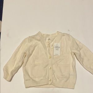 Baby gap creme color cardigan. Tags attached